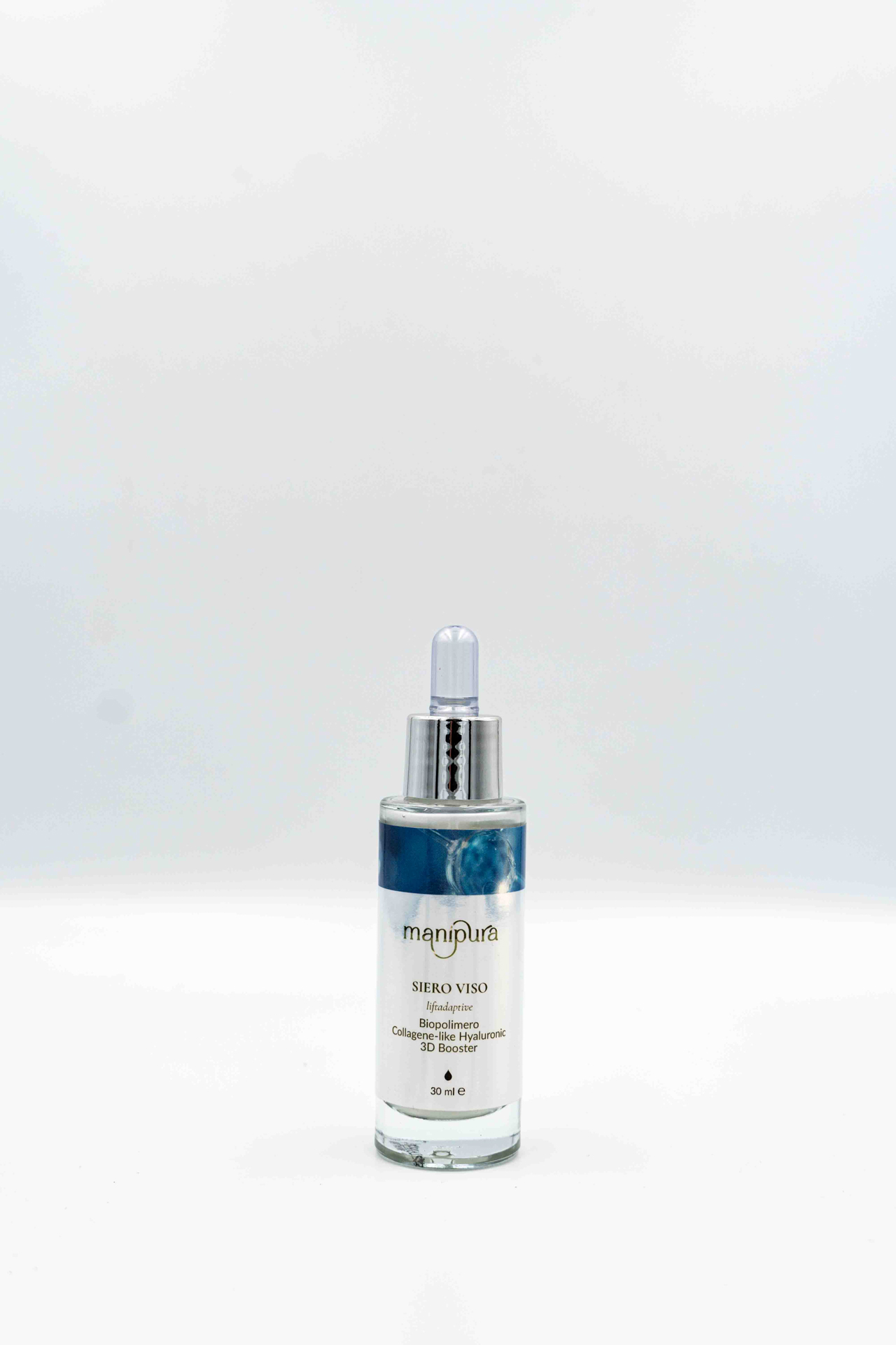 Flacone aperto del Siero Viso Liftadaptive di Manipura, con tappo e contagocce trasparente montato e formula visibile, fotografato frontalmente su sfondo bianco.